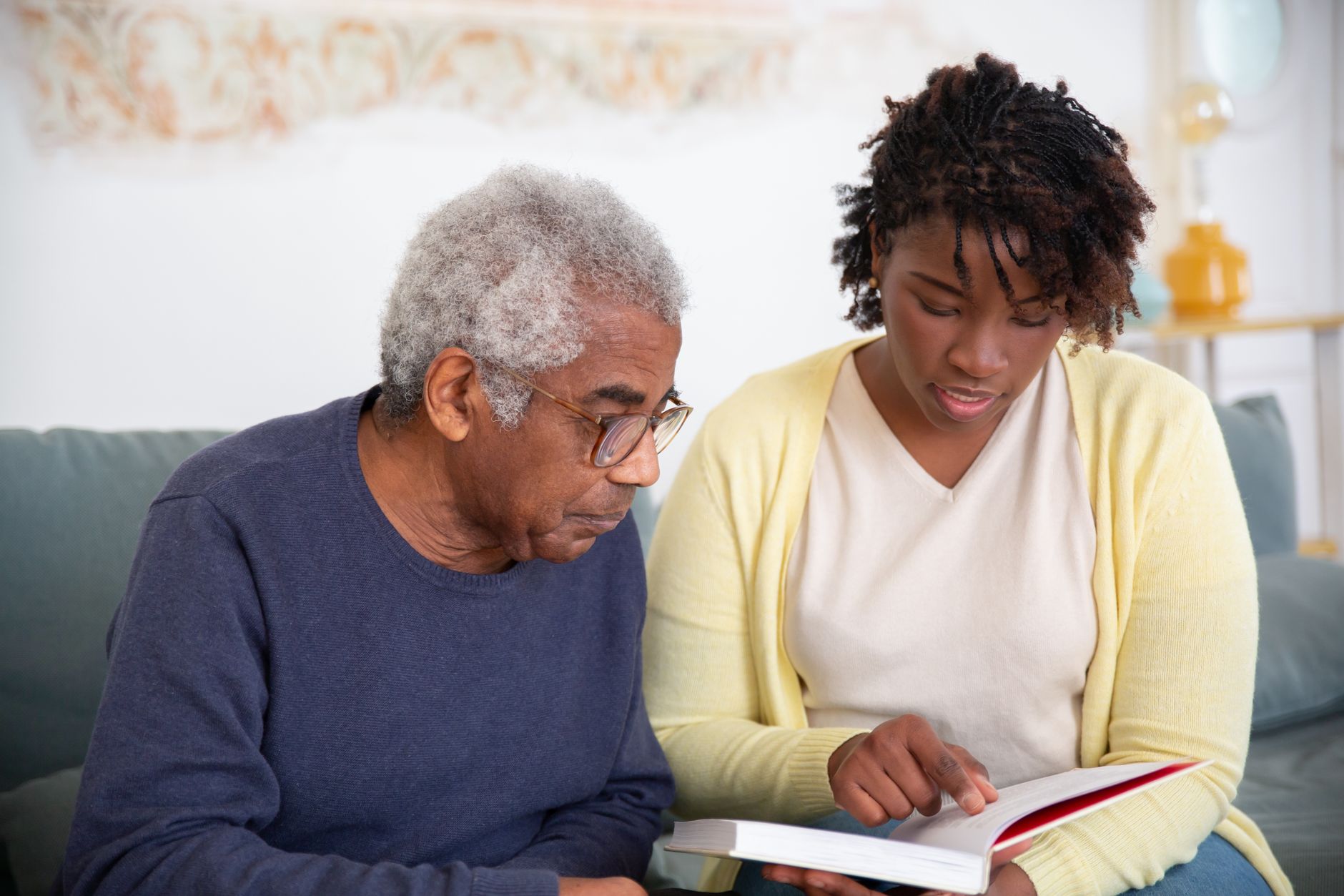 Illustrative stock photograph showing an attentive conversation in a care setting.